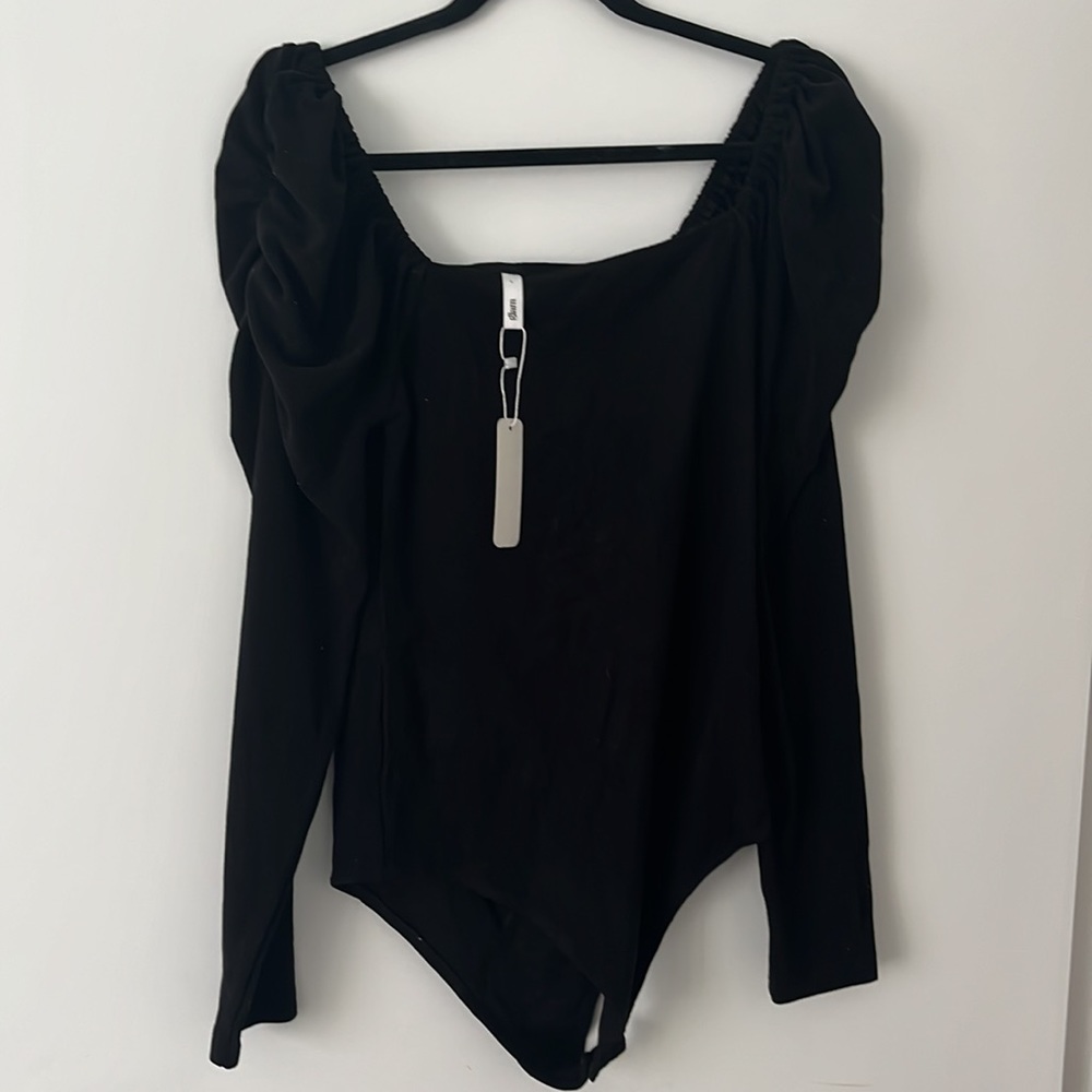 Woman black bodysuit